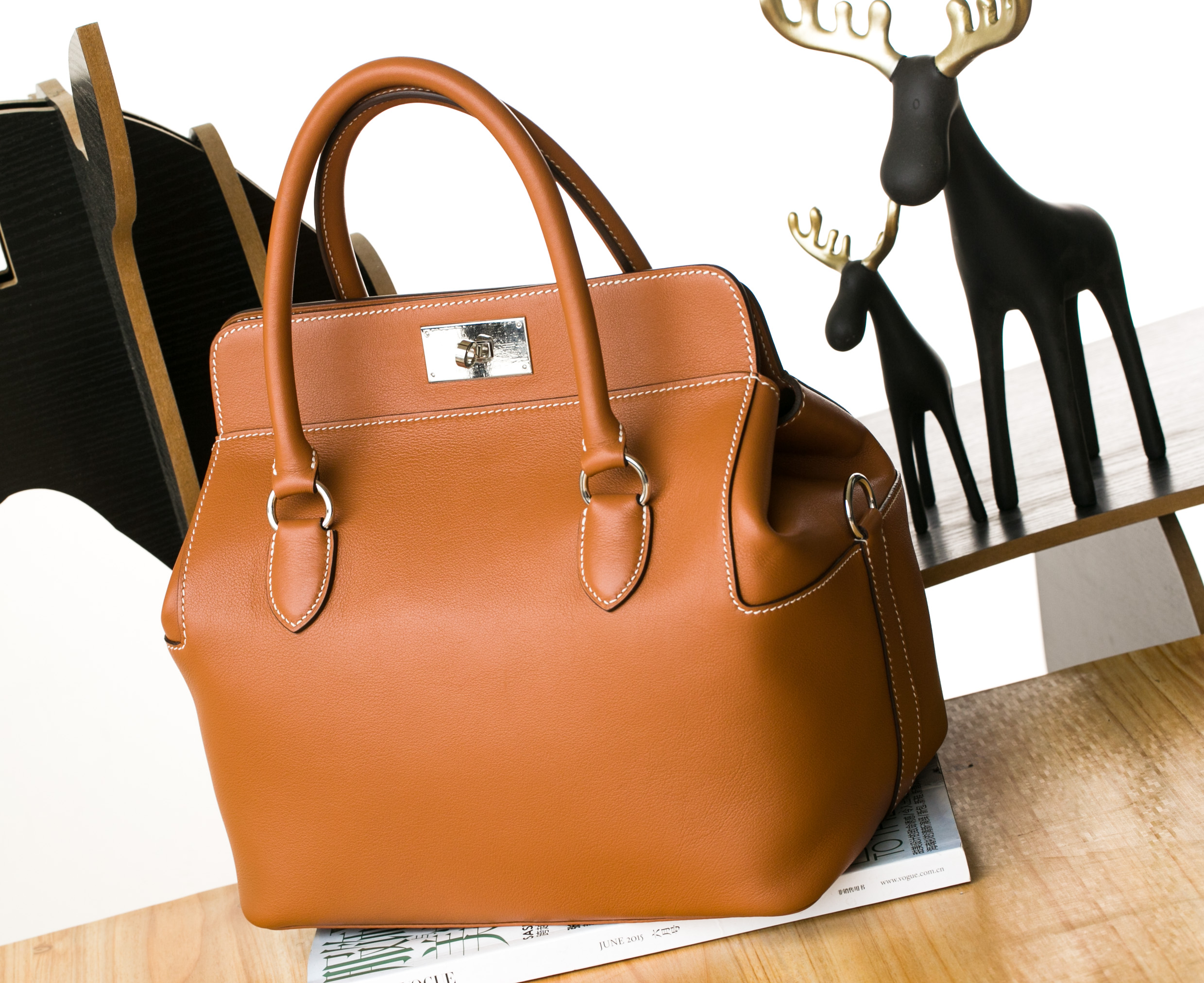 Hermes女包价格 爱马仕CK37金色原厂swift牛皮Toolbox 20cm