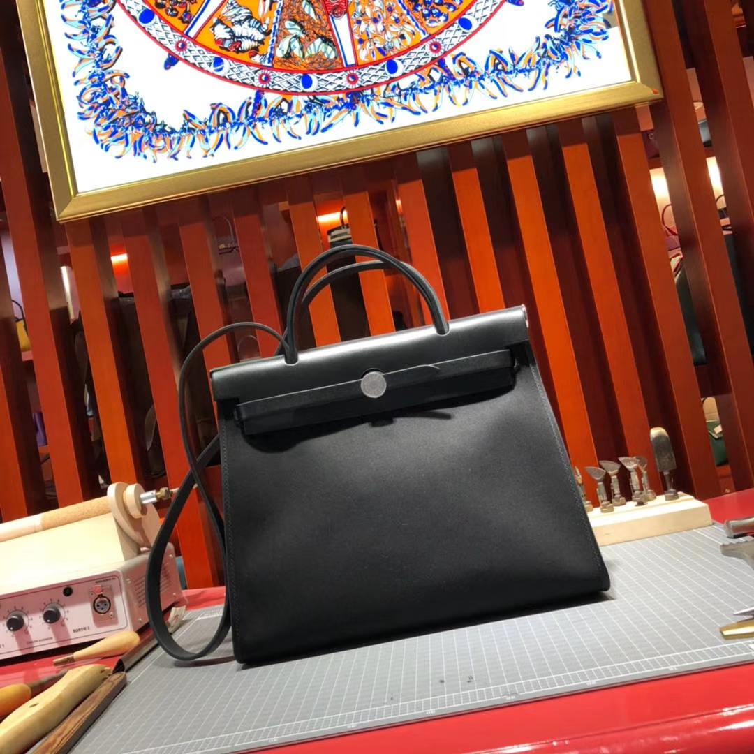 爱马仕包包批发 Hermes黑色马鞭皮拼帆布休闲Herbag手提单肩包31cm