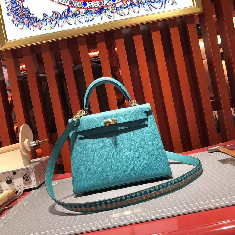 爱马仕Kelly包包 Hermes 7F孔雀蓝Epsom皮凯莉包 配Tressage Cuir肩带