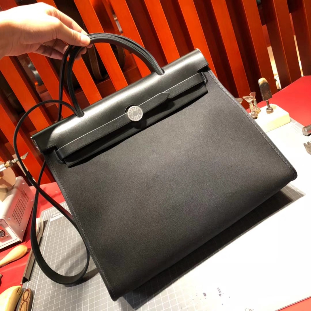 爱马仕包包批发 Hermes黑色马鞭皮拼帆布休闲Herbag手提单肩包31cm