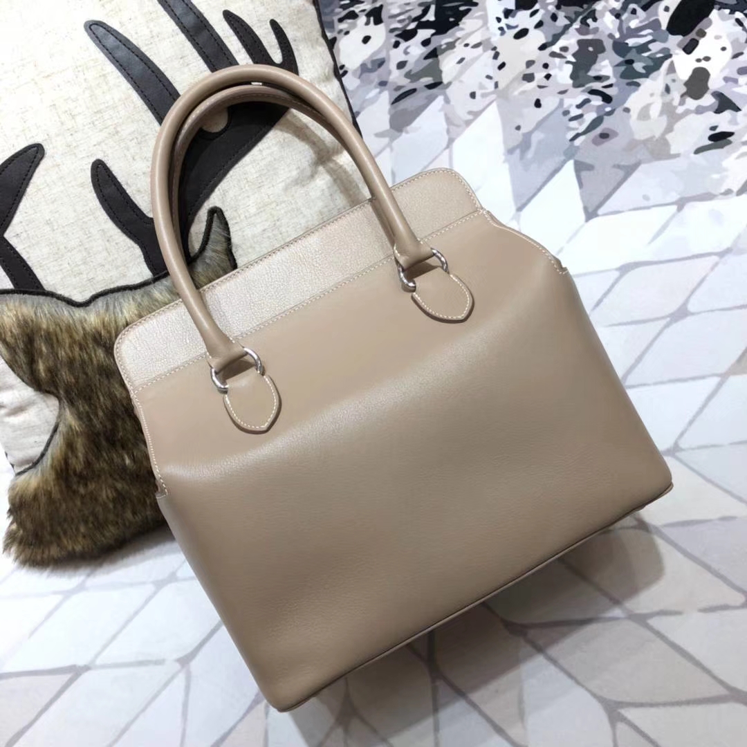 Hermes包包官网 爱马仕浅灰拼火焰橙牛奶包Toolbox26cm 银扣