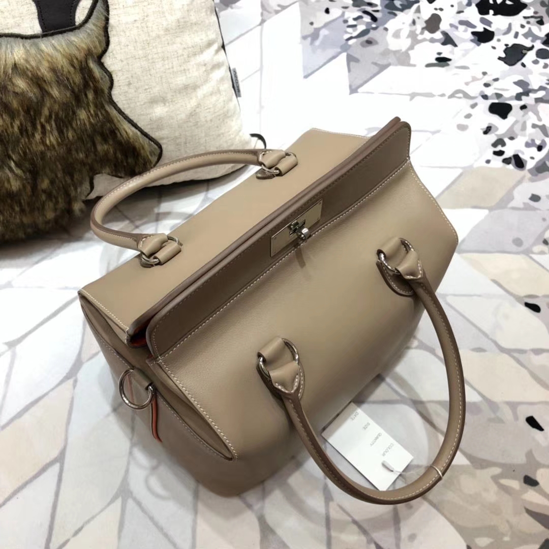 Hermes包包官网 爱马仕浅灰拼火焰橙牛奶包Toolbox26cm 银扣