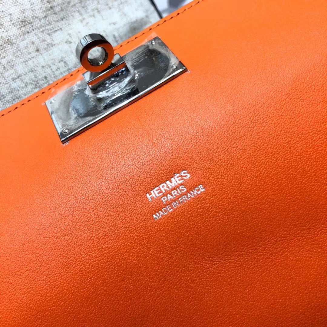 Hermes包包官网 爱马仕浅灰拼火焰橙牛奶包Toolbox26cm 银扣