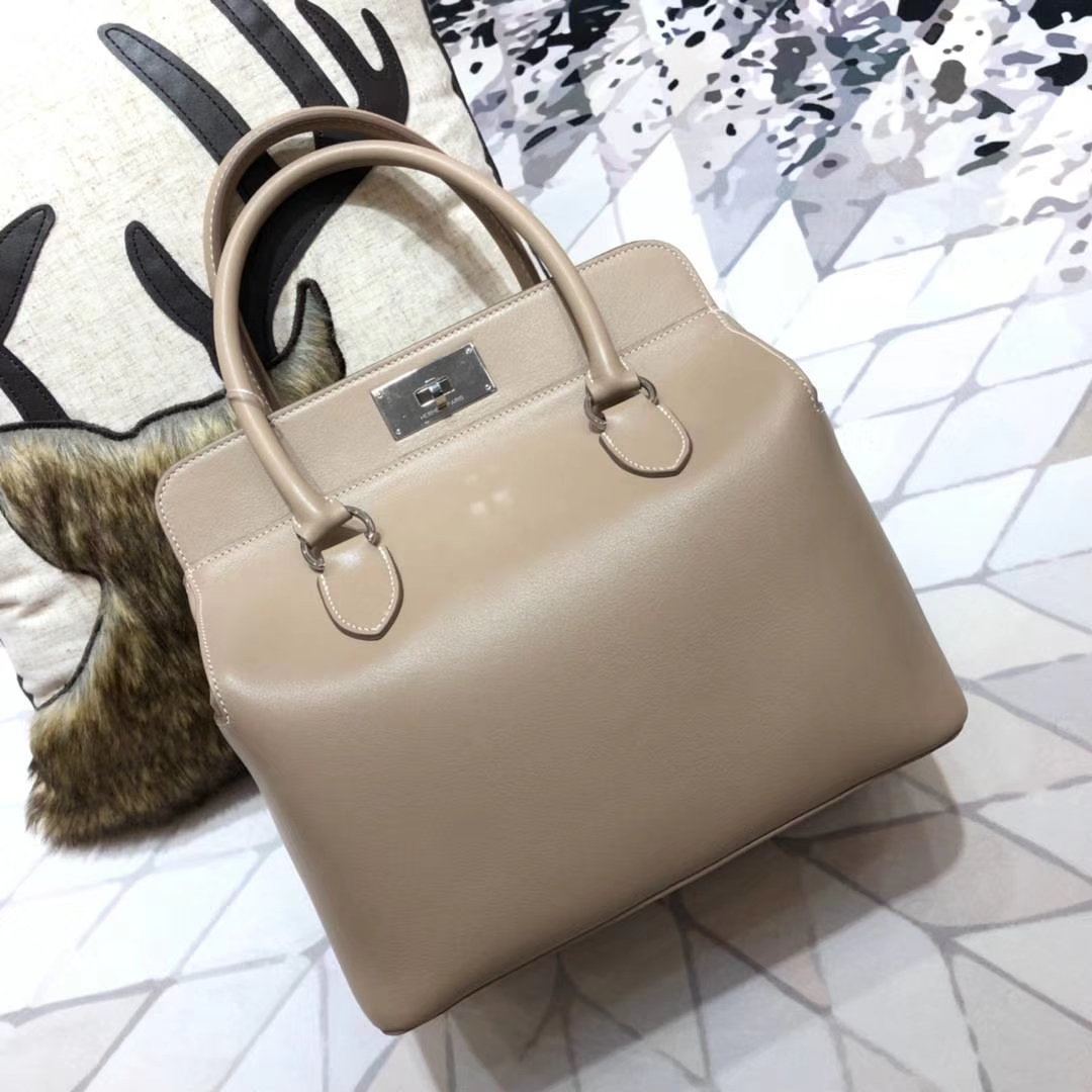 Hermes包包官网 爱马仕浅灰拼火焰橙牛奶包Toolbox26cm 银扣