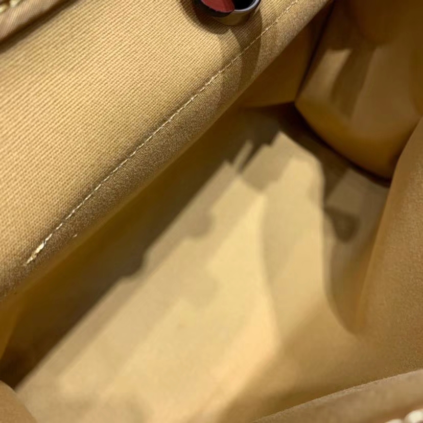 Hermes包包官网 爱马仕杏色帆布拼马鞍皮Herbag手提拼色女包 银扣
