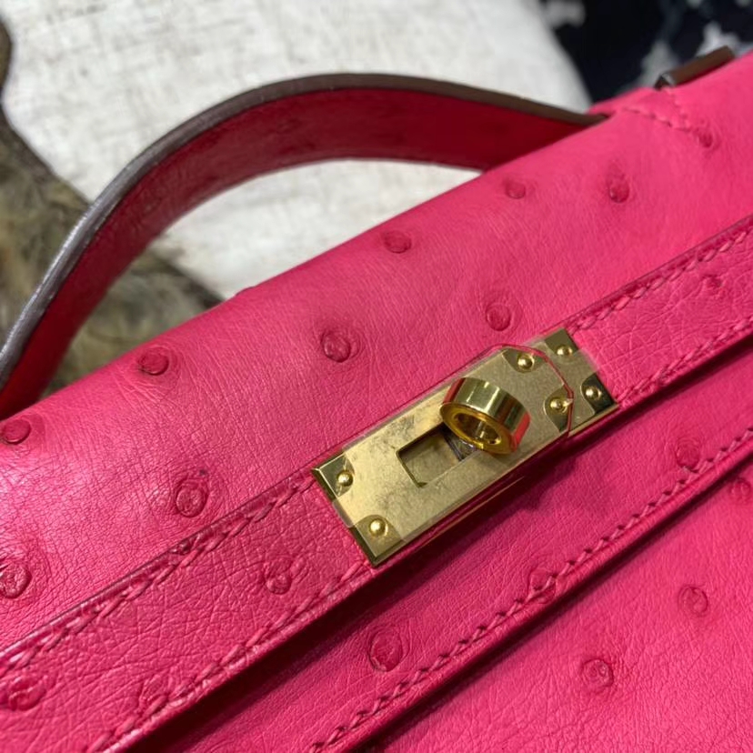 厂家直销 Hermes爱马仕E5玫红色南非鸵鸟皮迷你凯莉包Minikelly Pochette22CM 金扣