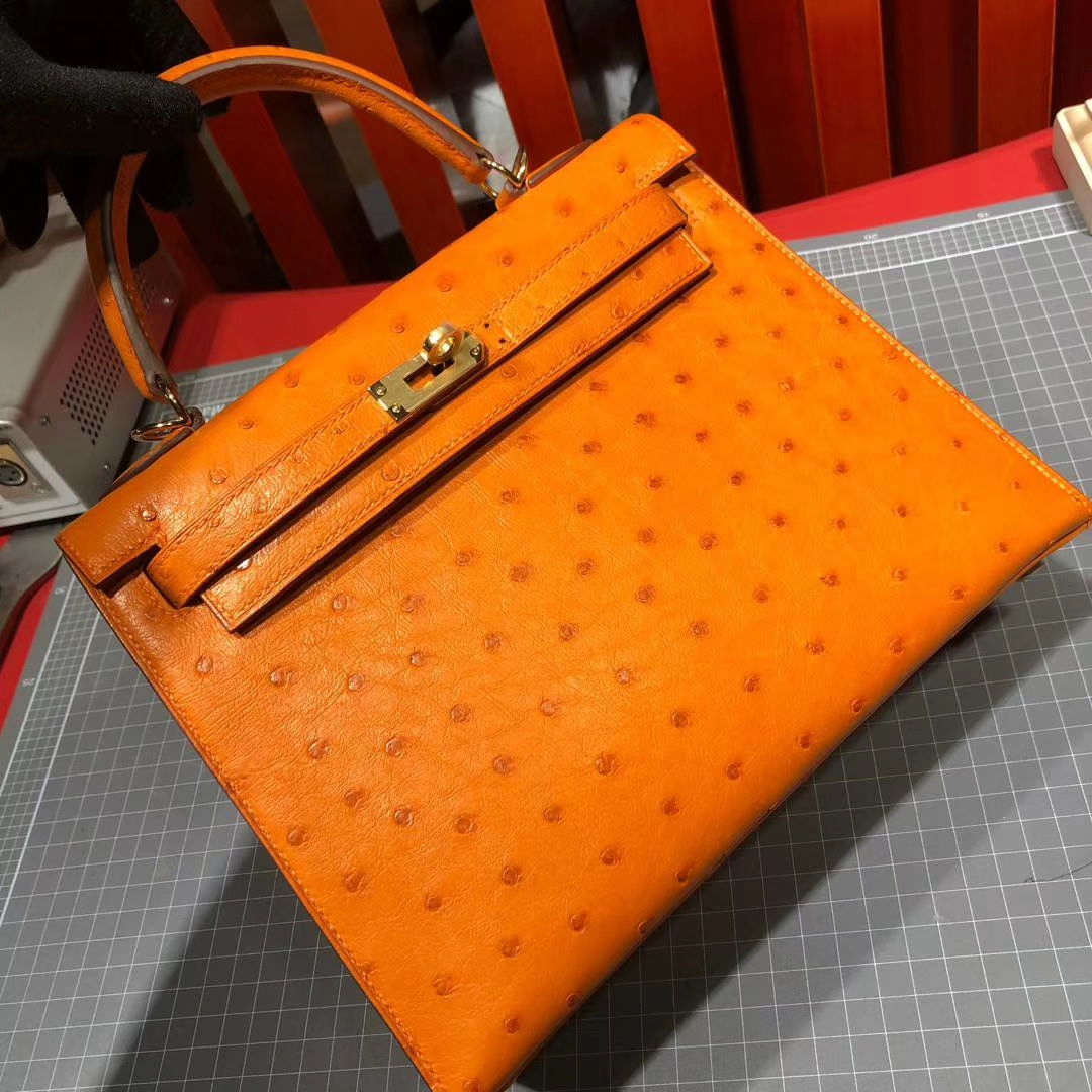 爱马仕凯莉包价格 Hermes Kelly25CM 亮黄色进口南非鸵鸟皮手提女包 金扣
