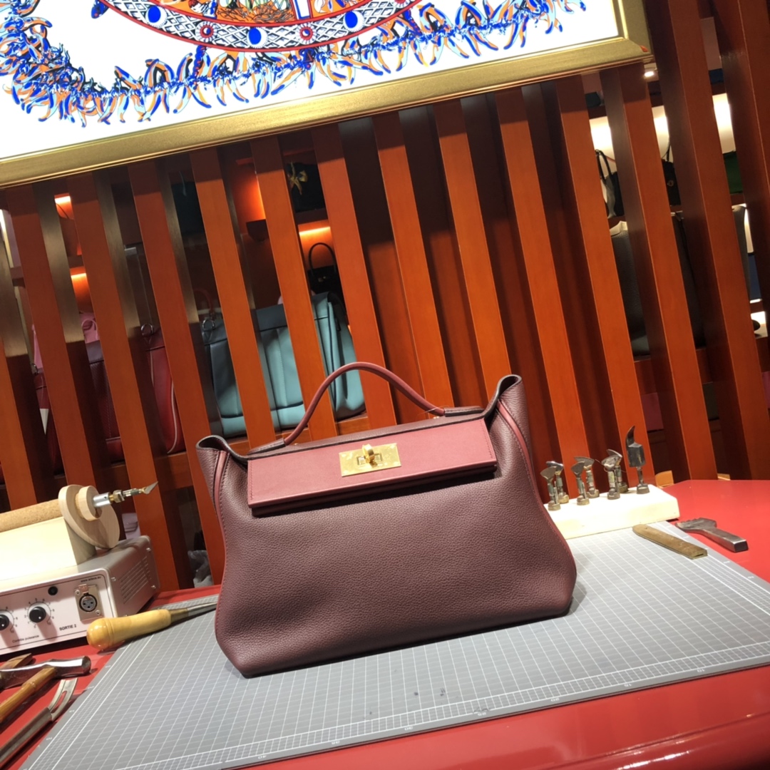 Hermes包包官网 爱马仕波尔多酒红法国Taurillon maurice皮24-24Kelly29CM 金扣