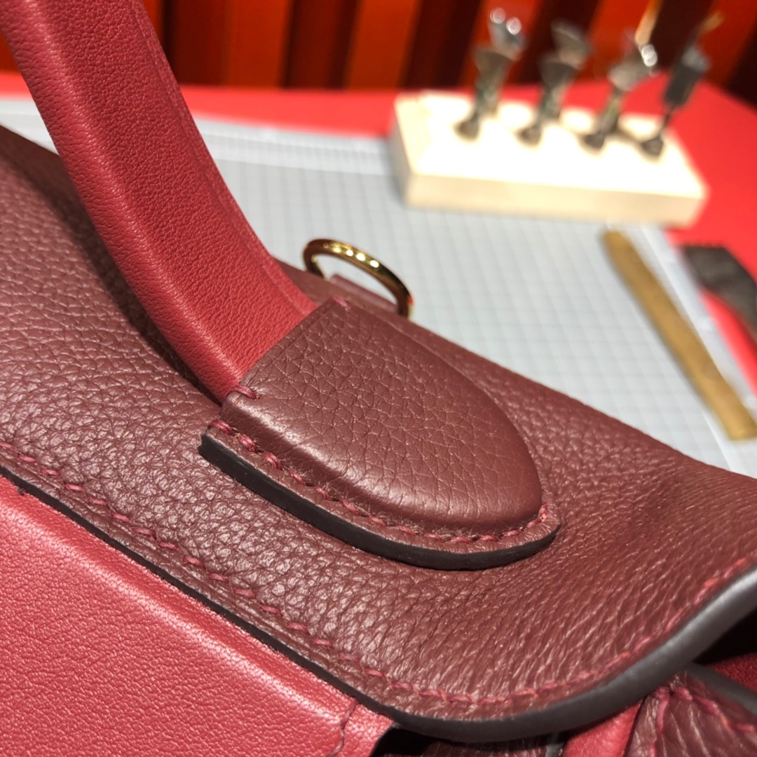 Hermes包包官网 爱马仕波尔多酒红法国Taurillon maurice皮24-24Kelly29CM 金扣