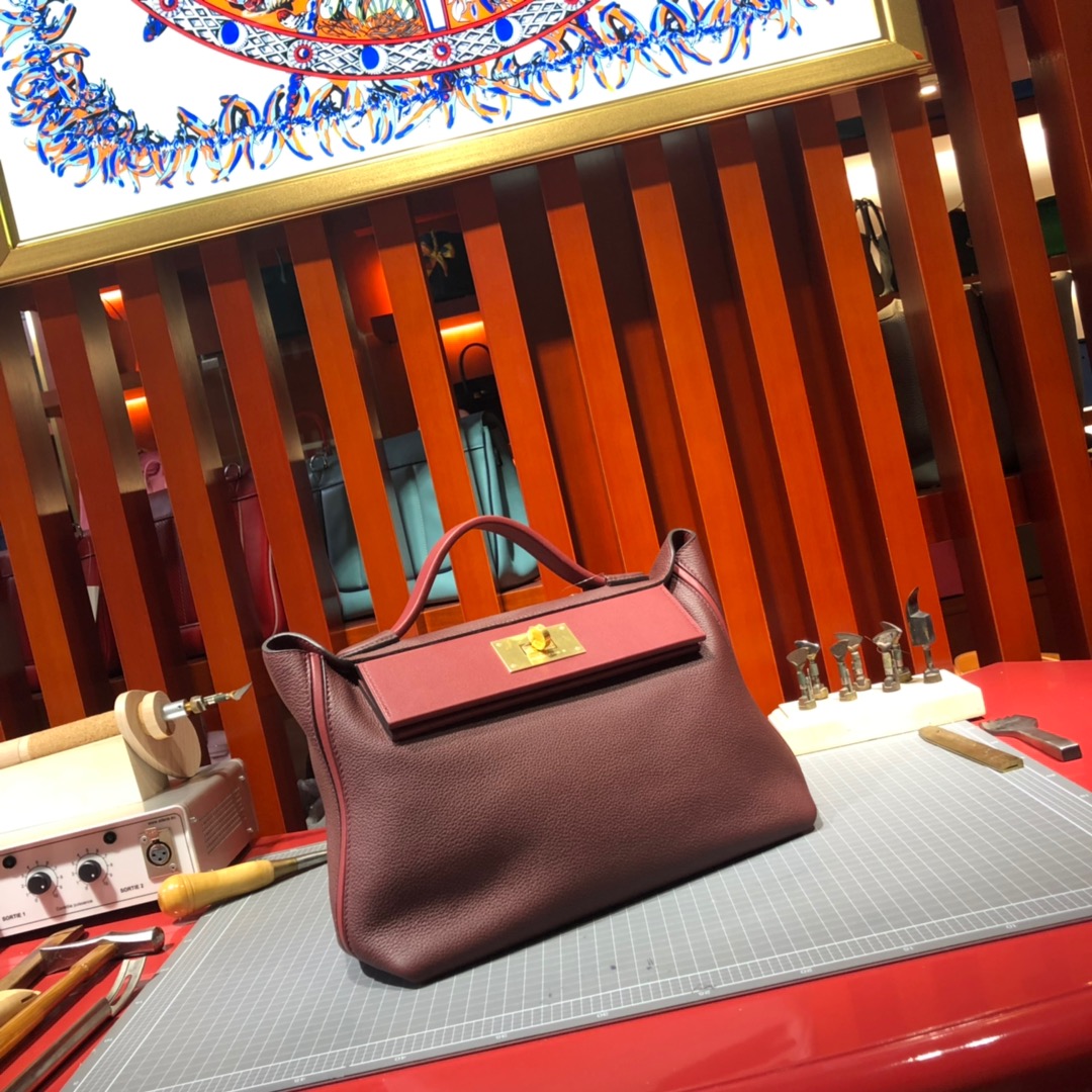 Hermes包包官网 爱马仕波尔多酒红法国Taurillon maurice皮24-24Kelly29CM 金扣