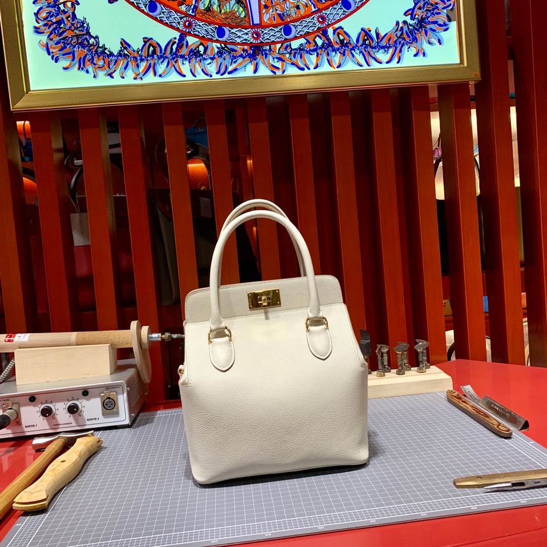 Hermes包包货源 爱马仕evercolor皮Toolbox20cm牛奶盒子包 奶昔白