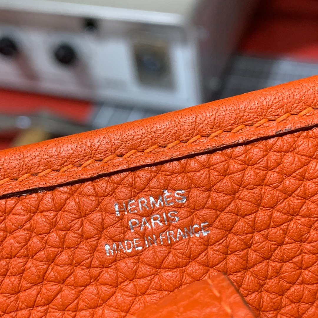 爱马仕女包批发 Hermes Mini Evelyne17CM 火焰橙TC牛皮伊芙琳包 银扣