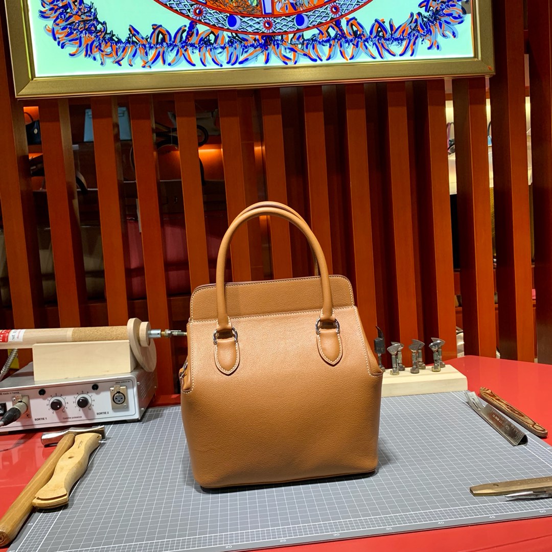爱马仕牛奶包尺寸 Hermes金棕色进口Swift皮toolbox包包20cm 金银扣