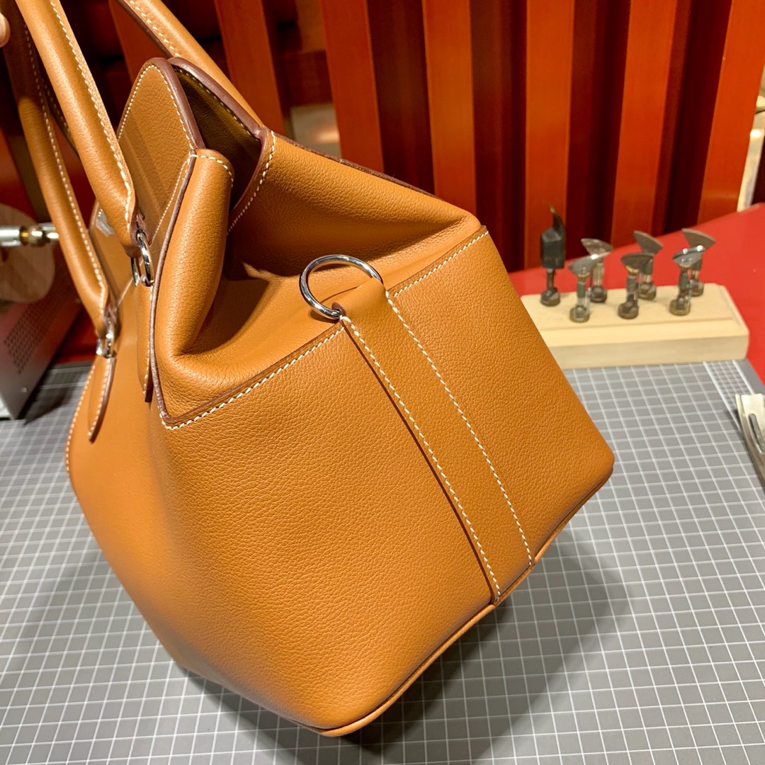 爱马仕牛奶包尺寸 Hermes金棕色进口Swift皮toolbox包包20cm 金银扣