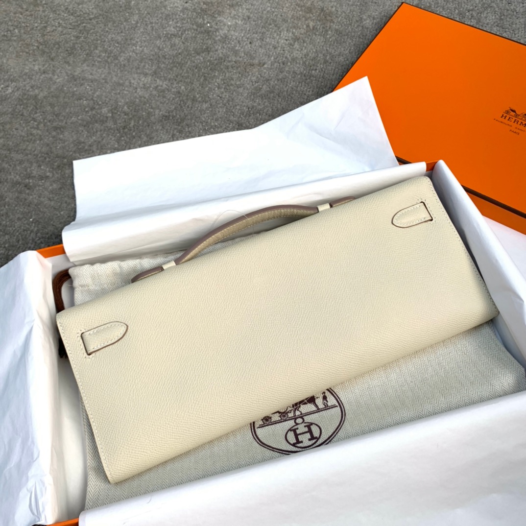 爱马仕手包价格 Hermes Kelly Cut 奶昔白进口掌纹牛皮手拿包 银扣