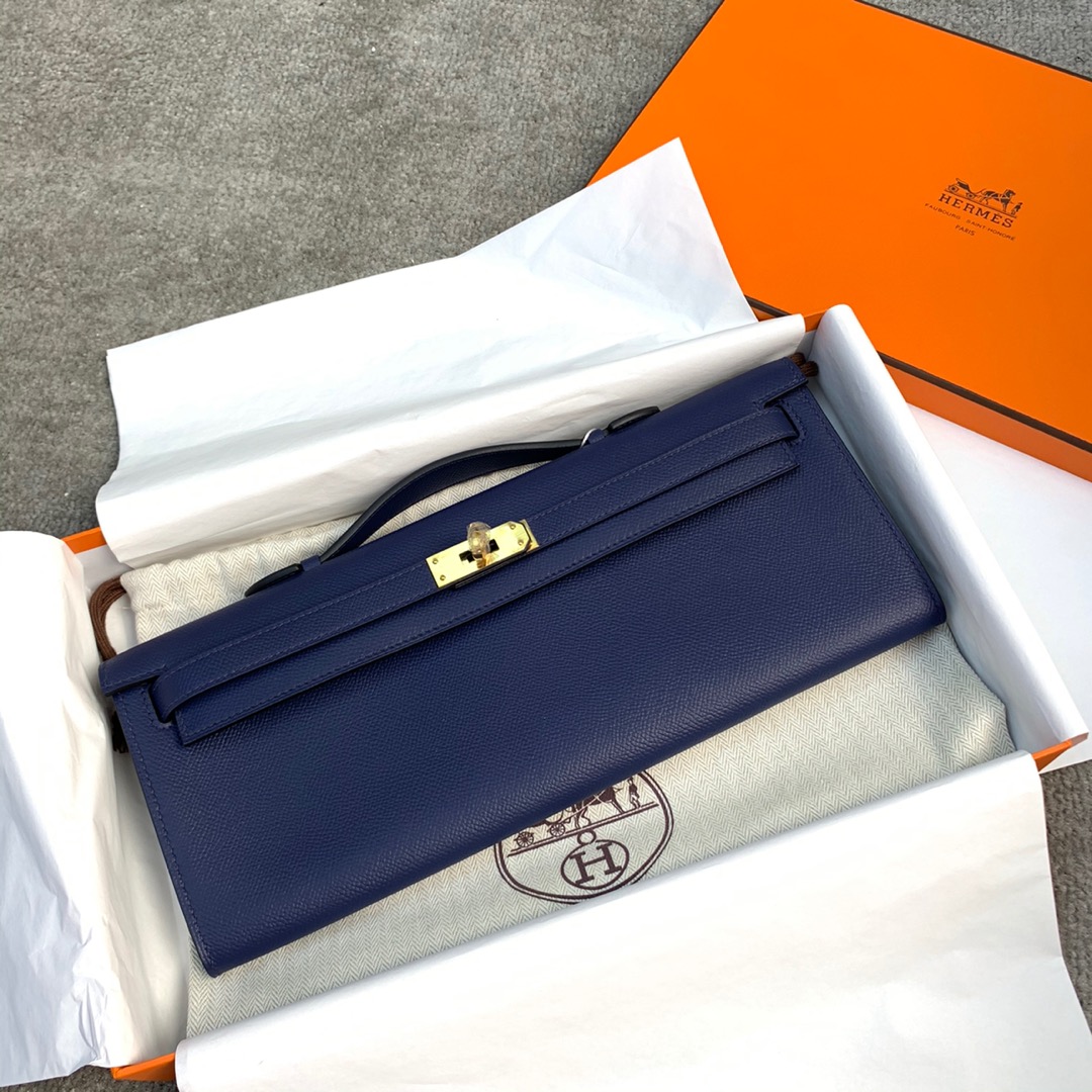 爱马仕经典款女包 Hermes Kelly Cut宝石蓝进口掌纹牛皮手拿包 金扣