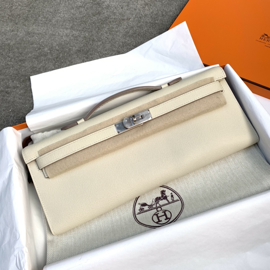 爱马仕手包价格 Hermes Kelly Cut 奶昔白进口掌纹牛皮手拿包 银扣