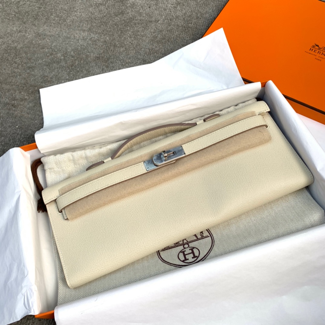 爱马仕手包价格 Hermes Kelly Cut 奶昔白进口掌纹牛皮手拿包 银扣